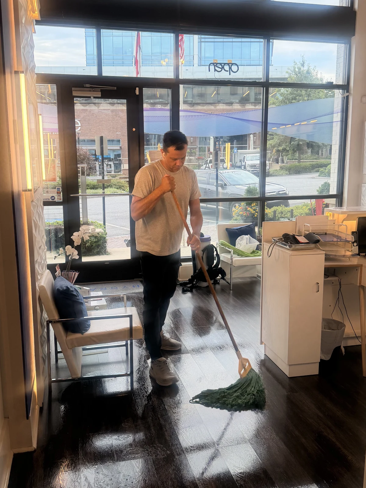 Top Vision crew mopping the floor of a Sandy Springs business